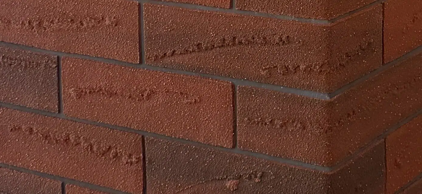 Close-up of handmade European brick veneer and groutless shadow joints on a Prospect Mailbox